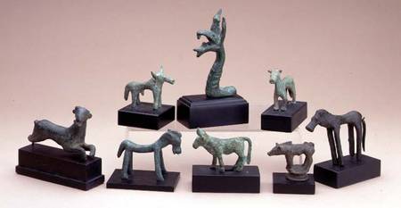 Collection of Greek bronze animals including a boara griffin and a running deer from Anonymous