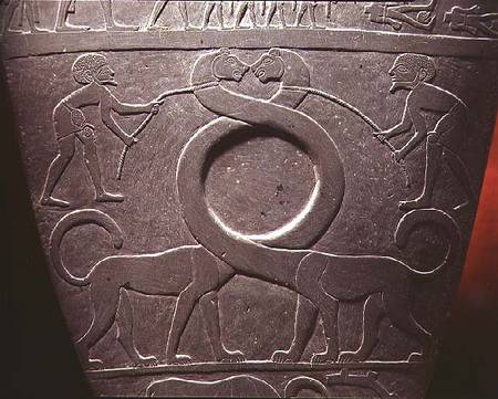 The Narmer Palette: ceremonial palette depicting a pair of long-necked cats being held on leashes from Anonymous