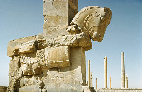 Sculpture of a Bullwith a view of the Hall of a Hundred Columns and of the Apadana (audience hall) A from Anonymous