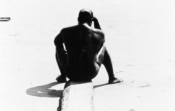 Shirtless Seated Man at Coney Island, Untitled 32 from Nat Herz