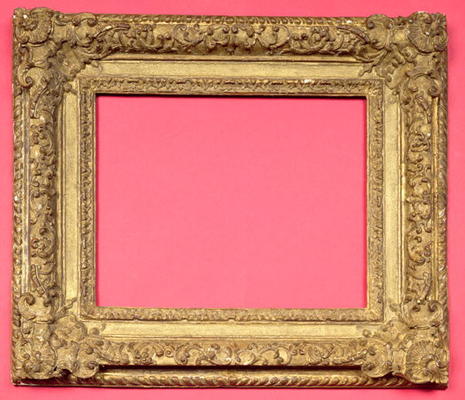 French Regence carved and gilded frame with foliate scrolls running to cartouche corners with shell from 